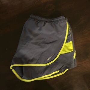 Sugoi athletic shorts with attached shorts/underwear. Great for workouts!